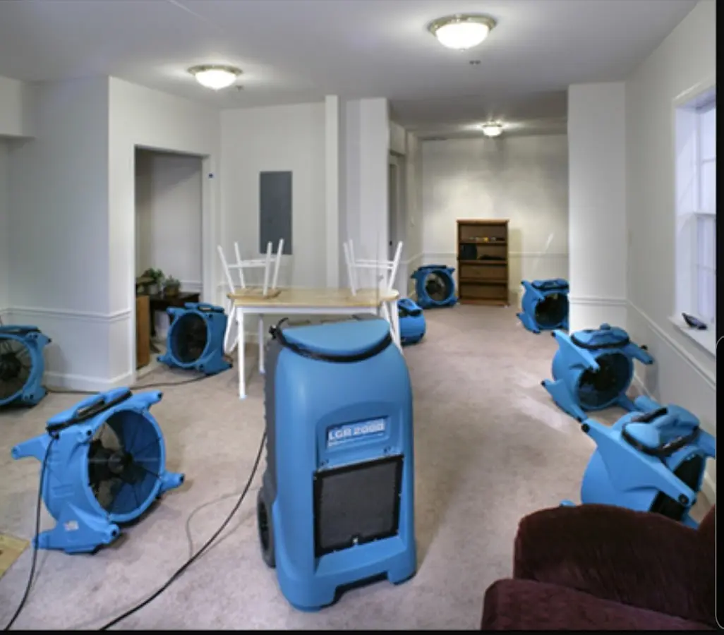 Air movers and dehumidifier setup for Water Damage Restoration in Los Banos